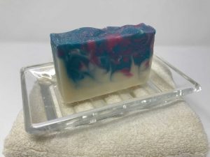 Blue, Pink, White Bar Soap on Glass Dish