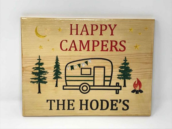 Carved happy camper sign
