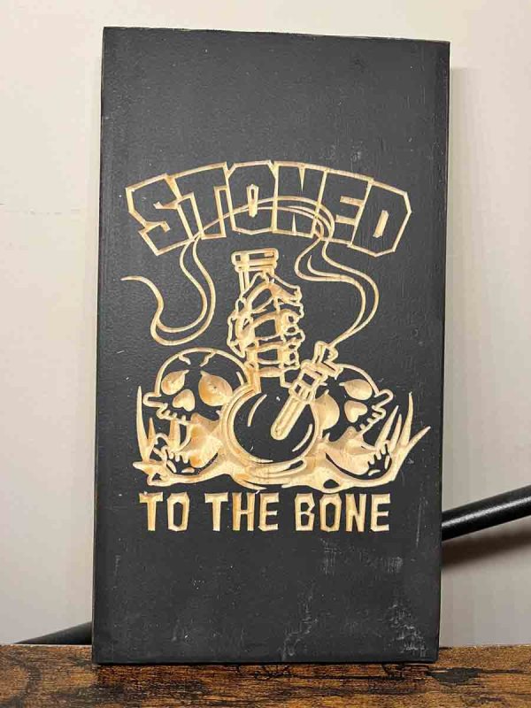 Handcarved stoned to the bone sign