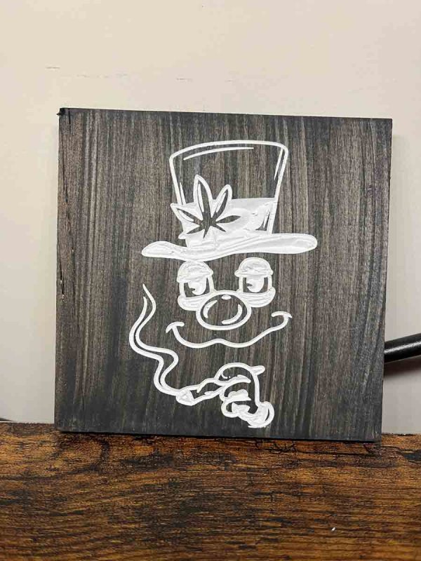 Handcarved weed snowman sign
